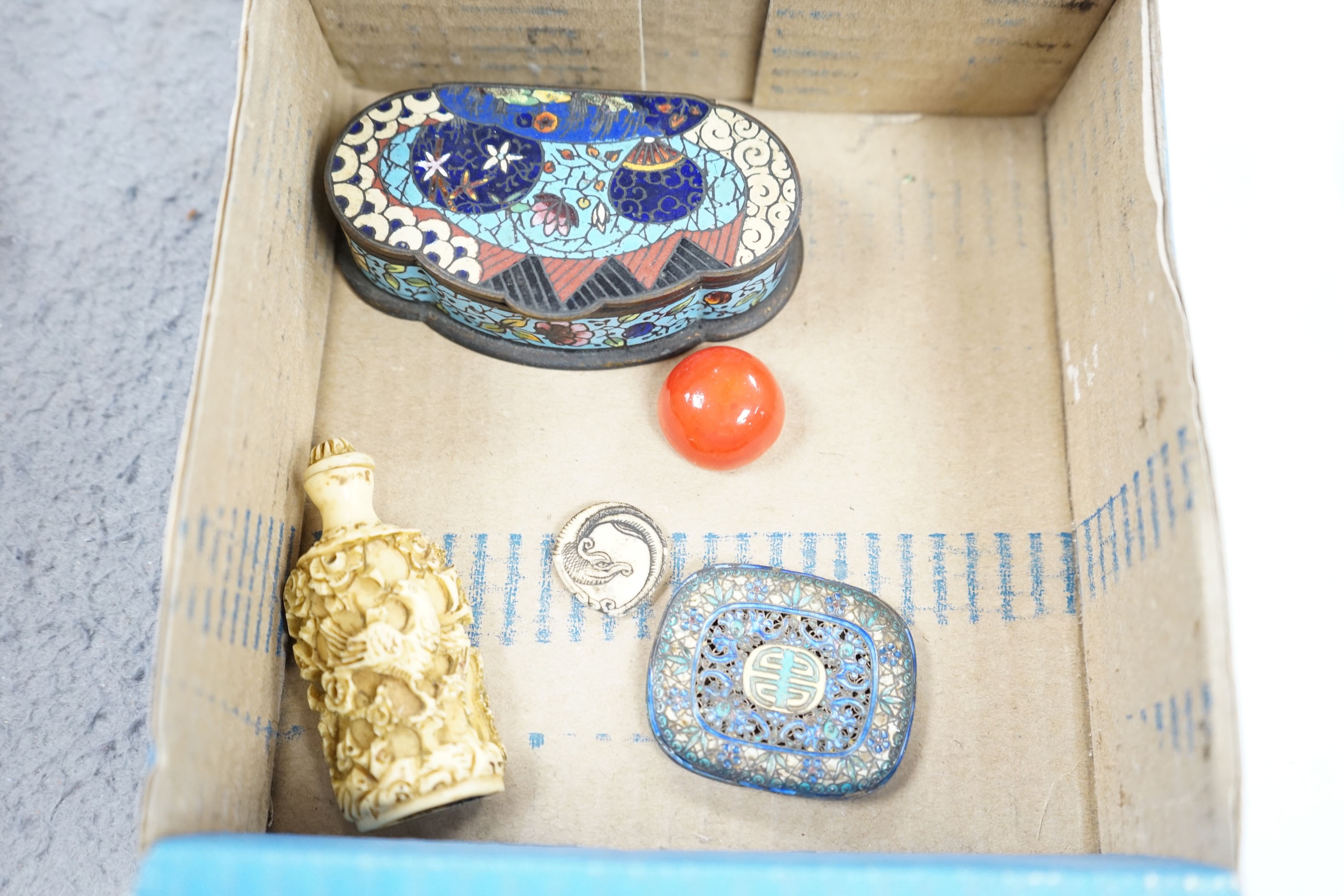 A group of Chinese Canton enamel trays, a Chinese lacquer box and cover, snuff bottles, two filigree work boxes, and a champlevé enamel box and cover, largest 10cm in diameter. Condition - varies